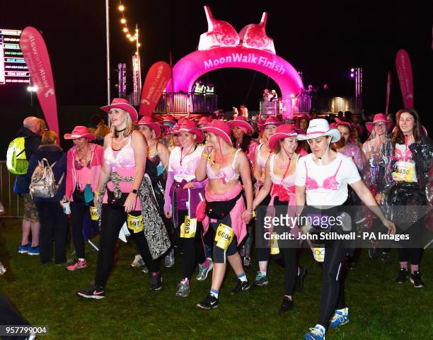 People taking part in the MoonWalk fundraiser for breast cancer charity Walk the Walk, as they set off from Clapham Common, on a half or full...