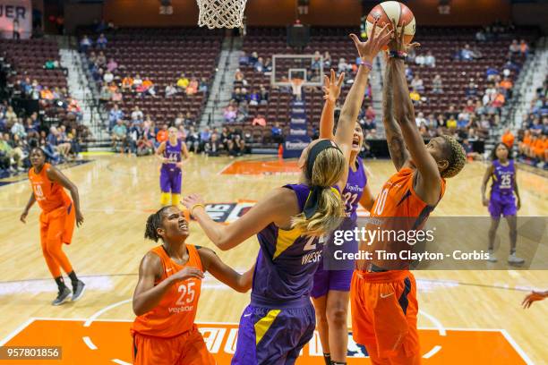 May 7: Courtney Williams of the Connecticut Sun, Sydney Wiese of the Los Angeles Sparks and Mistie Bass of the Los Angeles Sparks challenge for a...