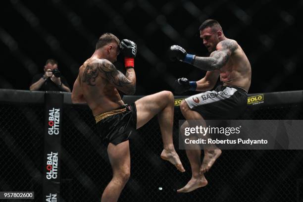 Sergej Maslobojev of Lithuania fights against Antonio Plazibat of Croatia during Catch Weight ONE Super Series Kick boxing match in the ONE...