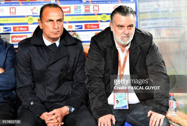 Montpellier's French head coach Michel Der Zakarian and Montpellier's French club president Laurent Nicollin react during the French L1 football...