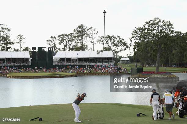 Webb Simpson of the United States plays his shot from the 17th tee during the third round of THE PLAYERS Championship on the Stadium Course at TPC...