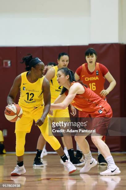 Chelsea Gray of the Los Angeles Sparks handles the ball against the China National Team during a pre-season game on May 12, 2018 at Pasadena City...