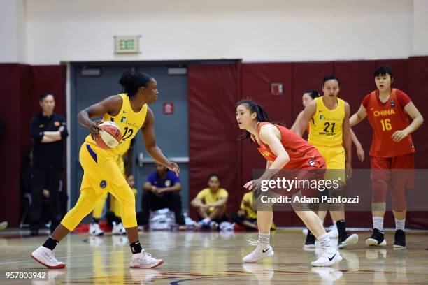 Chelsea Gray of the Los Angeles Sparks handles the ball against the China National Team during a pre-season game on May 12, 2018 at Pasadena City...