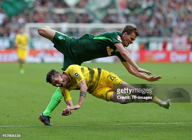 Sebastian Langkamp of Bremen and Maximilian Philipp of Dortmund battle for the ball during the Bundesliga match between SV Werder Bremen and Borussia...