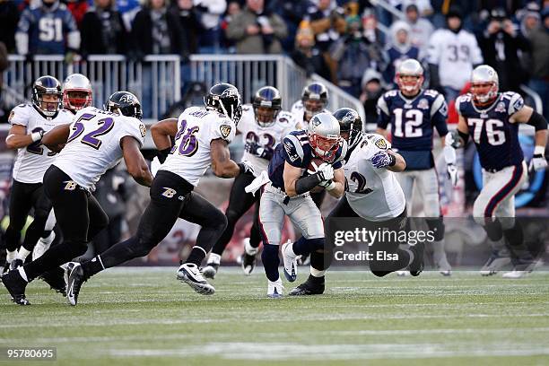 Julian Edelman of the New England Patriots returns a punt against the Baltimore Ravens during the 2010 AFC wild-card playoff game at Gillette Stadium...