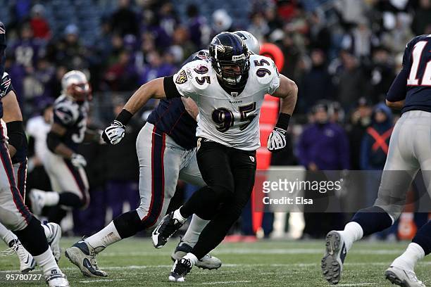 Jarret Johnson of the Baltimore Ravens rushes the quarterback against the New England Patriots during the 2010 AFC wild-card playoff game at Gillette...