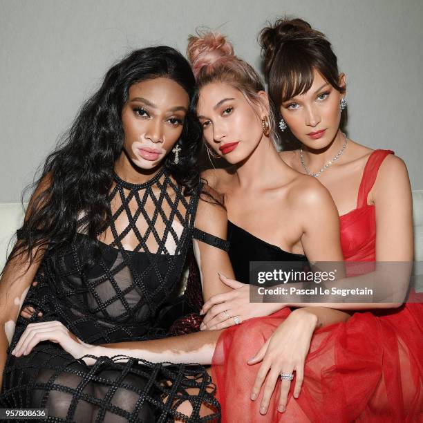 Winnie Harlow, Hailey Baldwin and Bella Hadid attend a Dior dinner during the 71st annual Cannes Film Festival at JW Marriott on May 12, 2018 in...