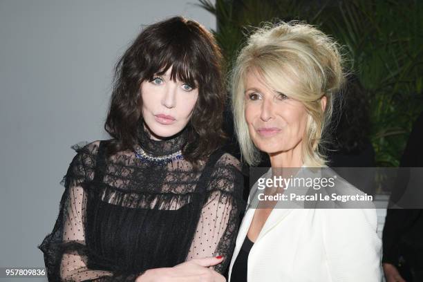 Isabelle Adjani and Anne Florence Schmitt attend a Dior dinner during the 71st annual Cannes Film Festival at JW Marriott on May 12, 2018 in Cannes,...