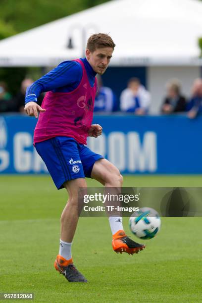 Bastian Oczipka of Schalke controls the ball during a training session at the FC Schalke 04 Training center on April 27, 2018 in Gelsenkirchen,...