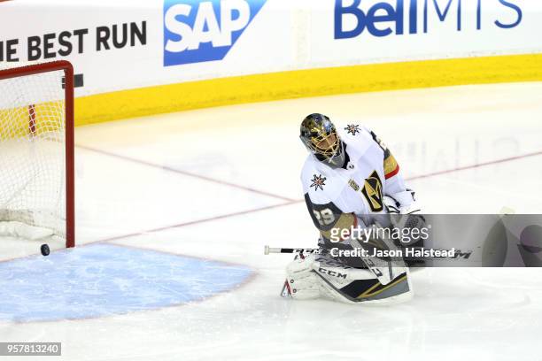 Marc-Andre Fleury of the Vegas Golden Knights allows a first period goal to Dustin Byfuglien of the Winnipeg Jets in Game One of the Western...