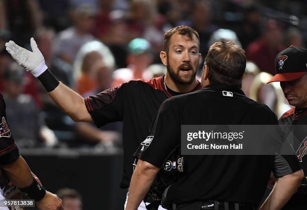 Steven Souza Jr of the Arizona Diamondbacks argues with home plate umpire Doug Eddings after being ejected during the eighth inning against the...