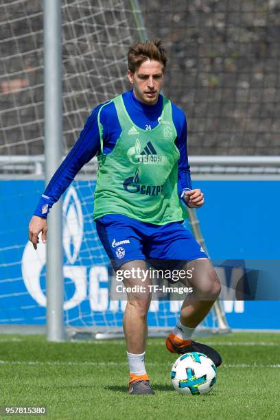 Bastian Oczipka of Schalke controls the ball during a training session at the FC Schalke 04 Training center on May 2, 2018 in Gelsenkirchen, Germany.