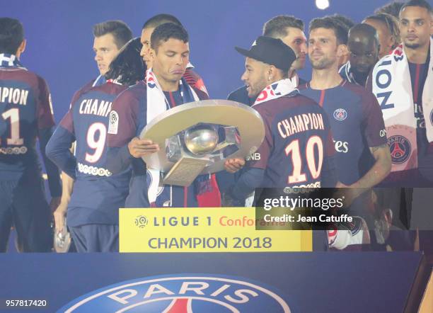 Thiago Silva, Neymar Jr, Thiago Motta of PSG celebrate during the French Ligue 1 Championship Trophy Ceremony following the Ligue 1 match between...