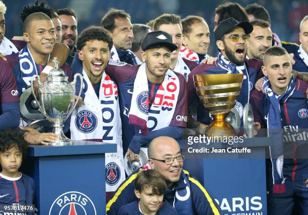 Kylian Mbappe, Marquinhos, Neymar Jr, Dani Alves aka Daniel Alves, Marco Verratti of PSG celebrate during the French Ligue 1 Championship Trophy...