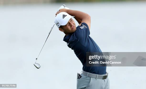 Xander Schauffele of the United States plays his second shot on the par 4, 18th hole during the third round of the THE PLAYERS Championship on the...