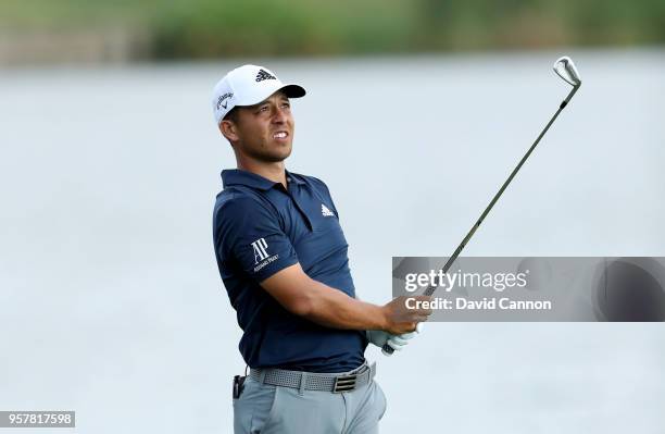 Xander Schauffele of the United States plays his second shot on the par 4, 18th hole during the third round of the THE PLAYERS Championship on the...