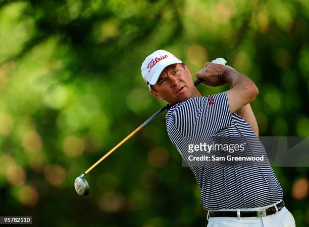 Davis Love III hits a shot during the first round of the Sony Open at Waialae Country Club on January 14, 2010 in Honolulu, Hawaii.