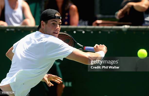 John Isner of the USA plays a backhand in his semi final match against Albert Montanes of Spain during day five of the Heineken Open at the ASB...