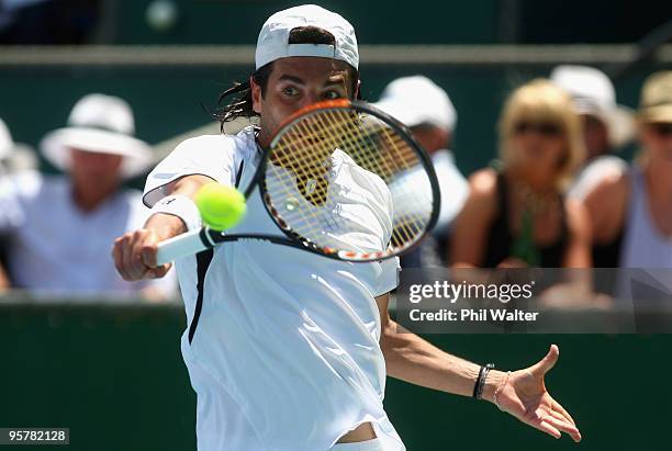 Albert Montanes of Spain plays a backhand in his semi final match against John Isner of the USA during day five of the Heineken Open at the ASB...