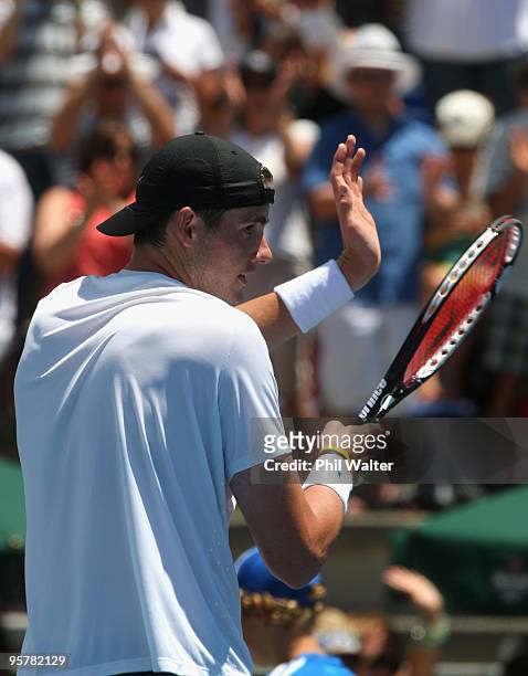 John Isner of the USA applauds the crowd following his semi final match against Albert Montanes of Spain during day five of the Heineken Open at the...