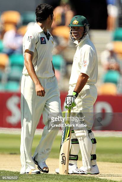 Umar Gul of Pakistan and Ricky Ponting of Australia exchange words after Michael Clarke of Australia was given not out during day two of the Third...