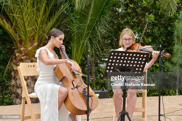 Olivia Culpo and Susan Curran attend 2018 Best Buddies Mother's Day Brunch Hosted by Vanessa & Gina Hudgens on May 12, 2018 in Malibu, California.