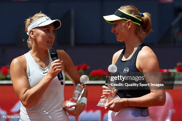 Elena Vesnina of Russia and Ekaterina Makarova of Russia with their trophies after winning Timea Babos of Hungry and Kristina Mladenovic of France in...