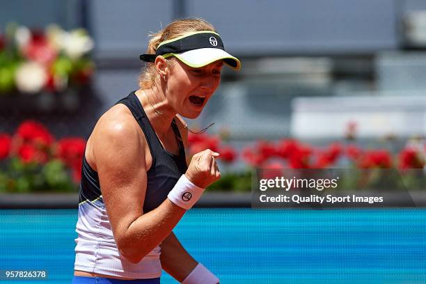 Ekaterina Makarova of Russia reacts during the match between Timea Babos of Hungry and Kristina Mladenovic of France during day eight of the Mutua...