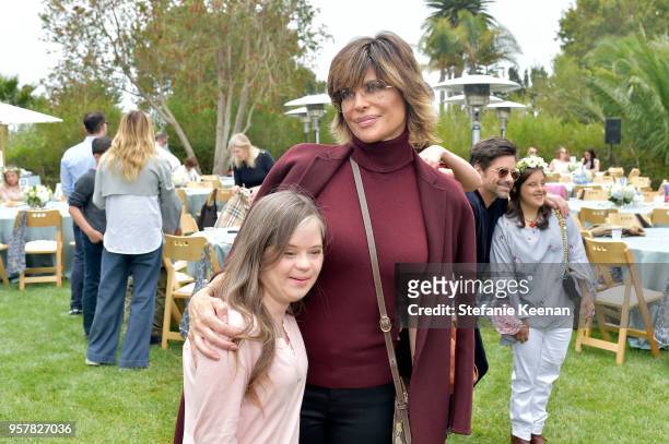 Lisa Rinna and guest attend 2018 Best Buddies Mother's Day Brunch Hosted by Vanessa & Gina Hudgens on May 12, 2018 in Malibu, California.