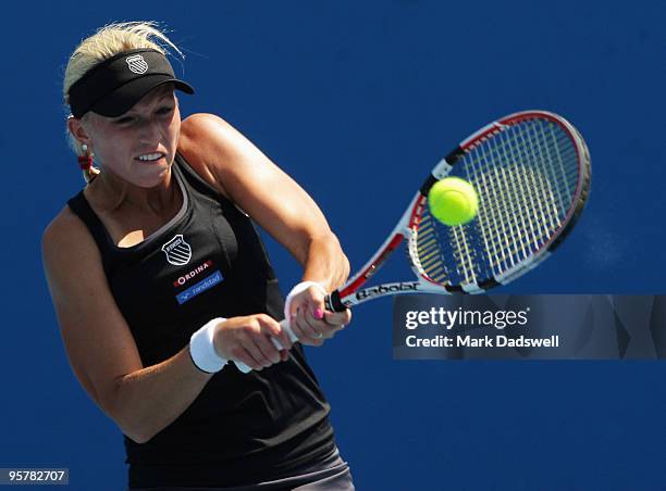 Michaella Krajicek of the Netherlands hits a backhand in her Women's Qualifying second round match against Laura Robson of Great Britain ahead of the...