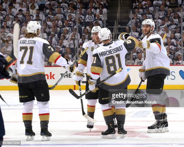 William Karlsson, Nate Schmidt, Jonathan Marchessault and Brayden McNabb of the Vegas Golden Knights celebrate a first period goal against the...