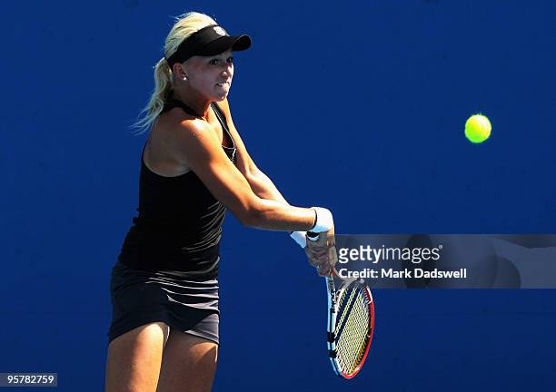 Michaella Krajicek of the Netherlands hits a backhand in her Women's Qualifying second round match against Laura Robson of Great Britain ahead of the...