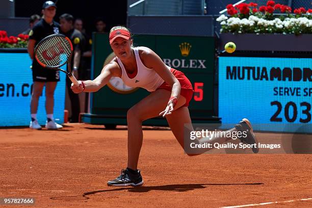 Kristina Mladenovic of France in action during the match between Ekaterina Makarova and Elena Vesnina of Russia during day eight of the Mutua Madrid...