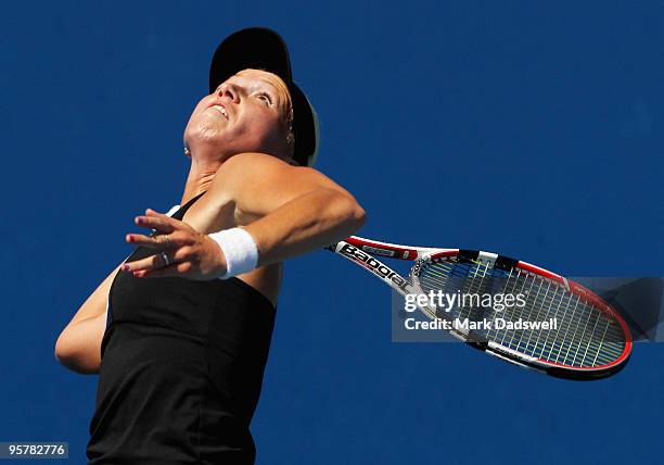 Michaella Krajicek of the Netherlands hits a serve in her Women's Qualifying second round match against Laura Robson of Great Britain ahead of the...