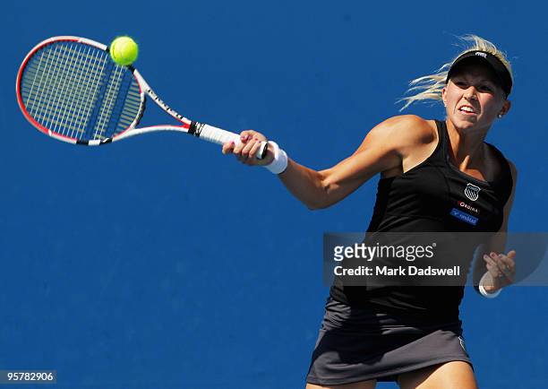 Michaella Krajicek of the Netherlands hits a forehand in her Women's Qualifying second round match against Laura Robson of Great Britain ahead of the...