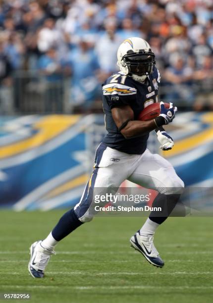 Running back LaDainian Tomlinson#21 of the San Diego Chargers throws a pass against the Cincinnati Bengals on December 20, 2009 at Qualcomm Stadium...