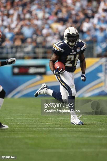 Running back LaDainian Tomlinson#21 of the San Diego Chargers throws a pass against the Cincinnati Bengals on December 20, 2009 at Qualcomm Stadium...