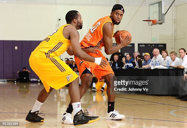Anthony Danridge of the Albuquerque Thunderbirds looks to make a move against Joe Crawford of the Los Angeles D-Fenders during the game at Toyota...