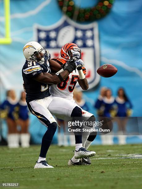 Cornerback Antonio Cromartie of the San Diego Chargersknor\cks a pass away from wide receiver Chad Ochochinco of the Cincinnati Bengals on December...