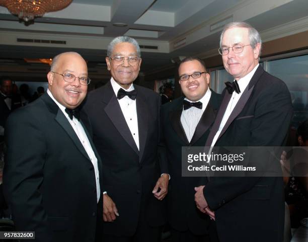 Portrait of US Federal Judge Matthew J Perry , his son, Michael , and US Federal Judge Joseph Fletcher Anderson Jr during reception guests following...