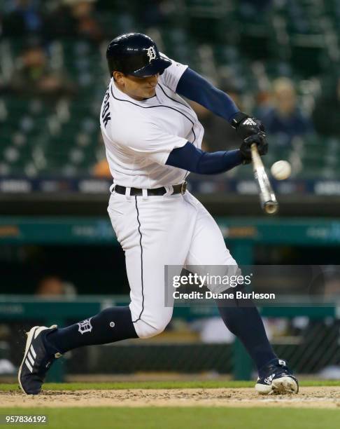 Mikie Mahtook of the Detroit Tigers singles against the Seattle Mariners during the fourth inning of game two of a doubleheader at Comerica Park on...