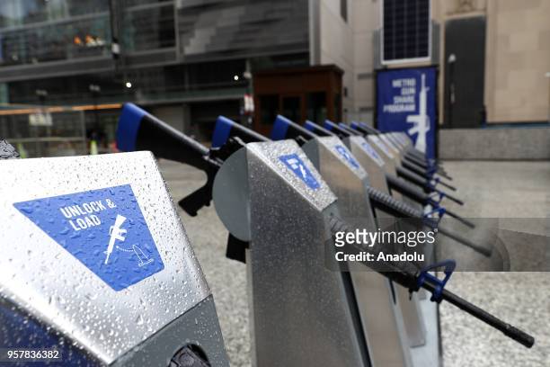 Row of 10 replicas of AR-15 rifles are displayed within the Gun Share Program to draw attention to armament at Daley Plaza in Chicago, United States...