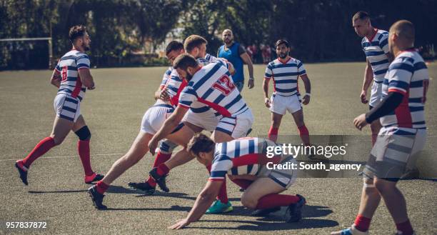 hard rugby game - work hard play hard stock pictures, royalty-free photos & images