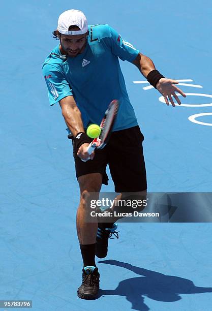 Fernando Gonzalez of Chile plays a backhand in his third round match against Ivan Ljubicic of Croatia during day three of the 2010 Kooyong Classic at...