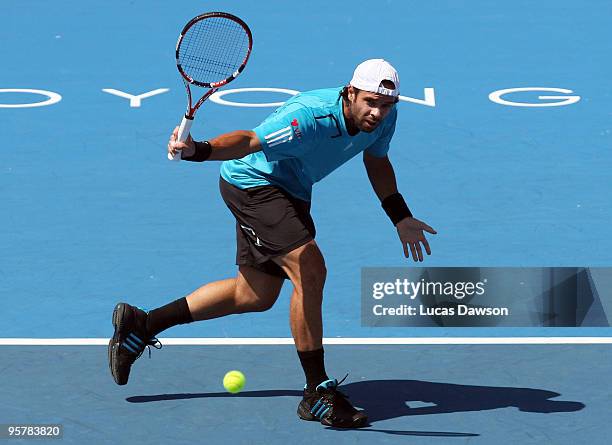 Fernando Gonzalez of Chile plays a backhand in his third round match against Ivan Ljubicic of Croatia during day three of the 2010 Kooyong Classic at...