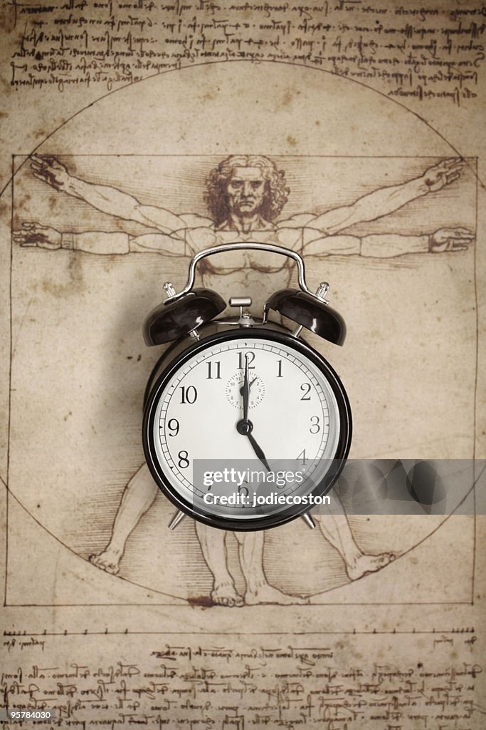Uhr und Vitruvischer Mann