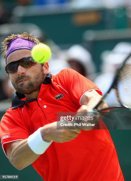 Arnaud Clement of France plays a backhand in his semi final match against Philipp Kohlschreiber of Germany during day five of the Heineken Open at...