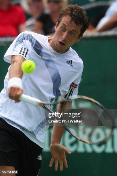 Philipp Kohlschreiber of Germany plays a backhand in his semifinal match against Arnaud Clement of France during day five of the Heineken Open at the...