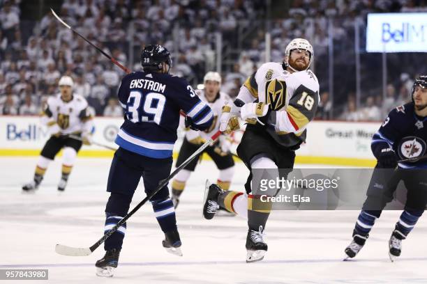 James Neal of the Vegas Golden Knights skates against Toby Enstrom of the Winnipeg Jets during the third period in Game One of the Western Conference...