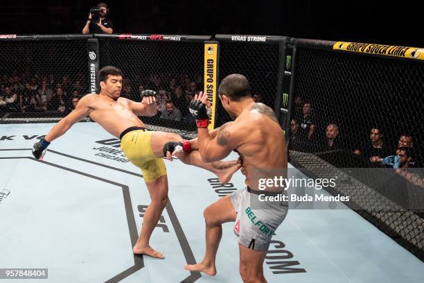 Lyoto Machida of Brazil kicks Vitor Belfort of Brazil in their middleweight bout during the UFC 224 event at Jeunesse Arena on May 12, 2018 in Rio de...